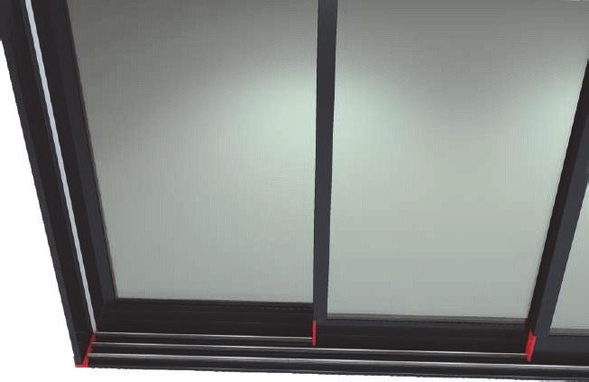 Détail haut des profils du mur de verre coulissant